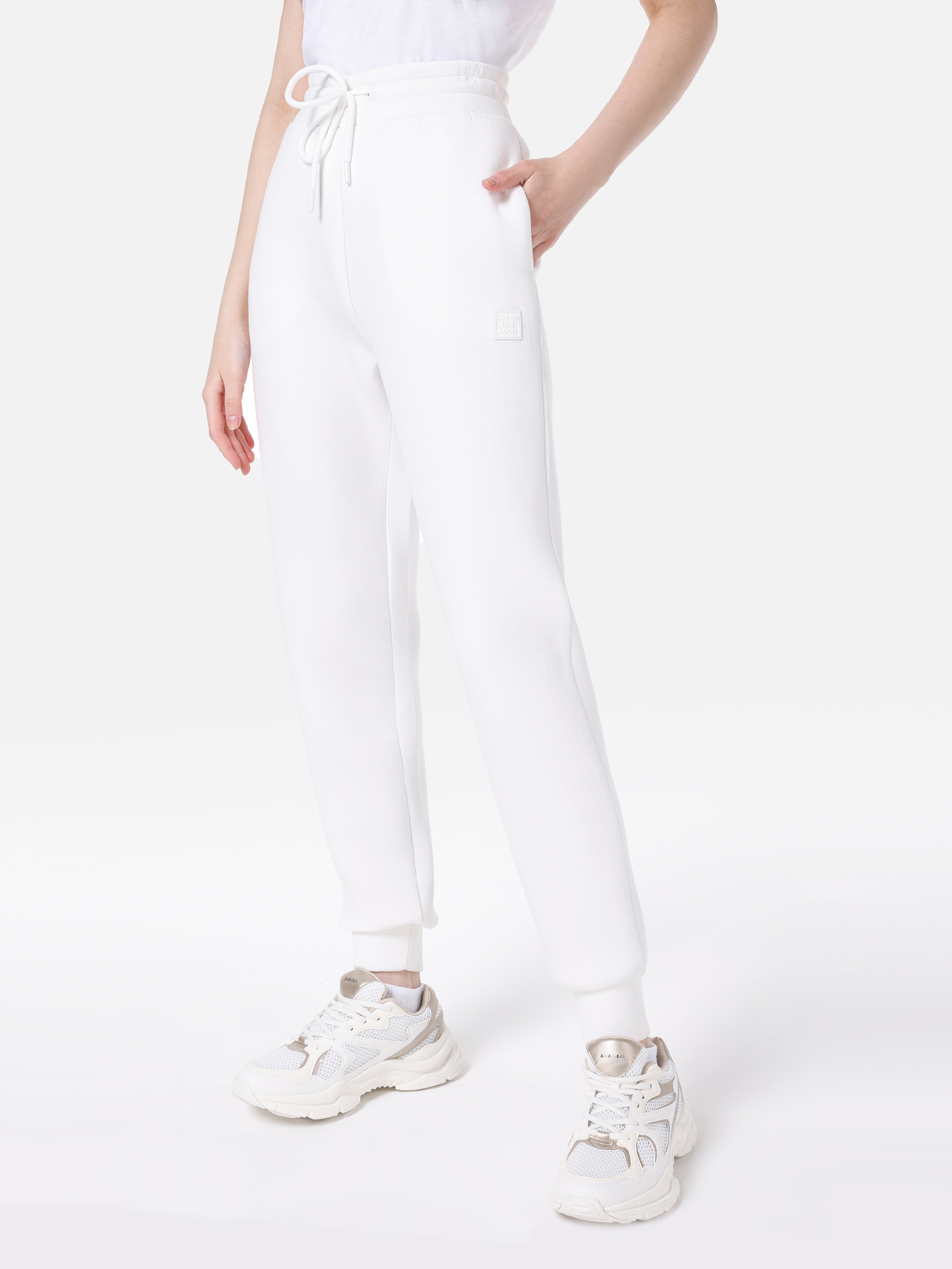 Показать информацию о Женские белые спортивные штаны с принтом slim fit средняя посадка