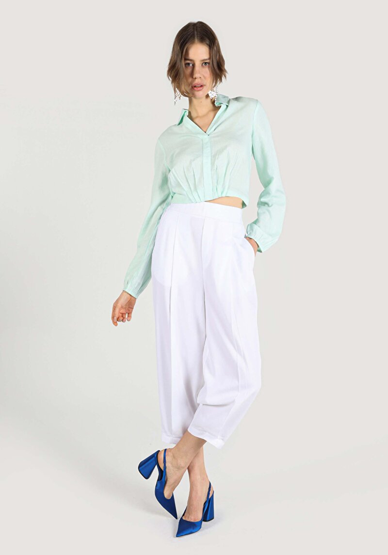 Показать информацию о Женские белые брюки с высокой посадкой и широкими штанинами