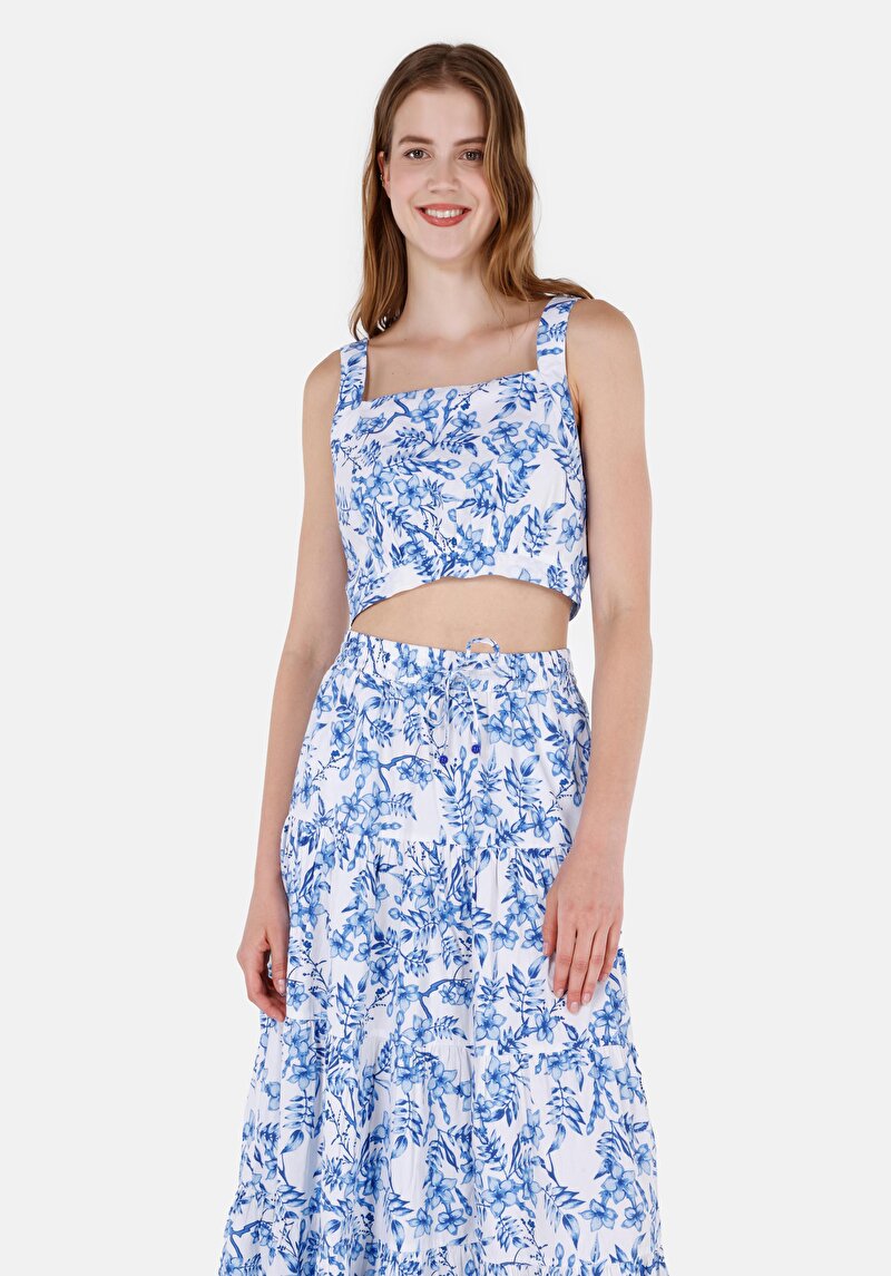 Изображение Женская белая рубашка облегающего кроя без рукавов с квадратным воротником и цветочным принтом