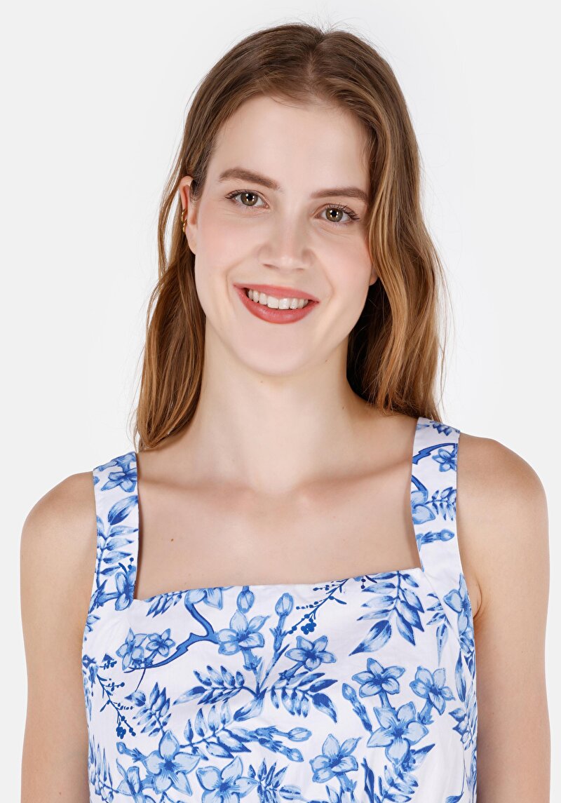 Показать информацию о Женская белая рубашка облегающего кроя без рукавов с квадратным воротником и цветочным принтом