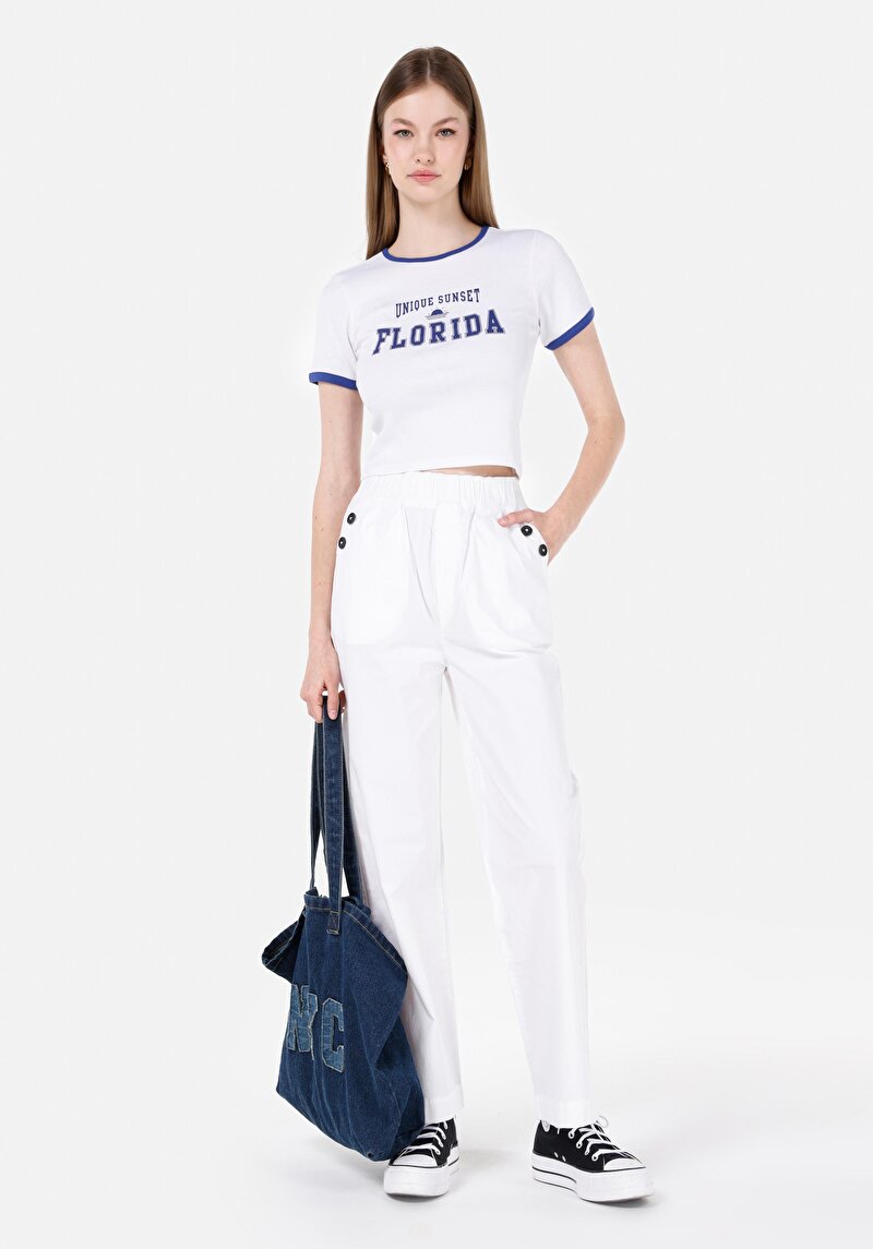 Изображение Женские белые брюки с высокой посадкой и широкими штанинами