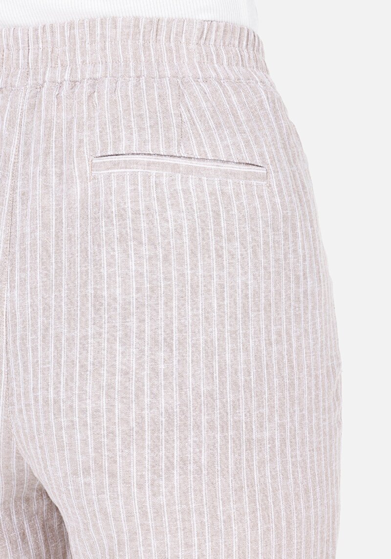 Показать информацию о Женские бежевые брюки прямого кроя, с заниженной талией