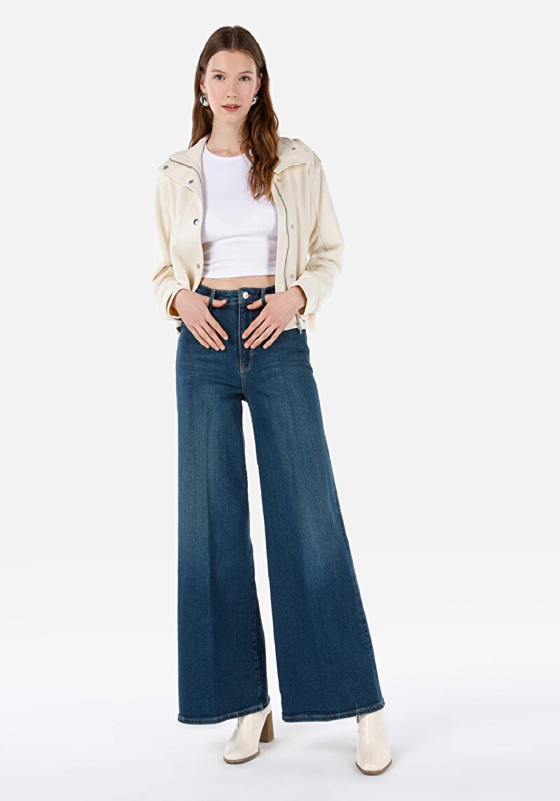 Изображение Женские джинсы цвета индиго со стандартным кроем, высокой талией и суперширокими штанинами