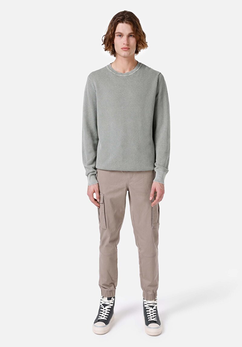 Показать информацию о Мужской зелёный жаккардовый свитер стандартного кроя с круглым вырезом