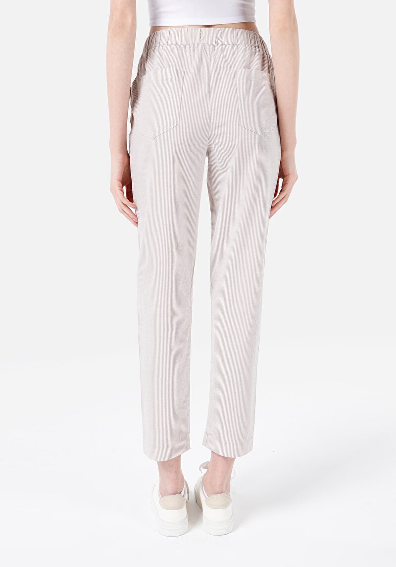 Показать информацию о Женские бежевые брюки прямого кроя, с заниженной талией