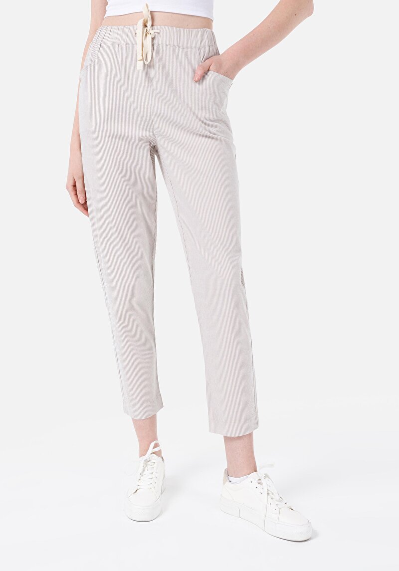 Показать информацию о Женские бежевые брюки прямого кроя, с заниженной талией