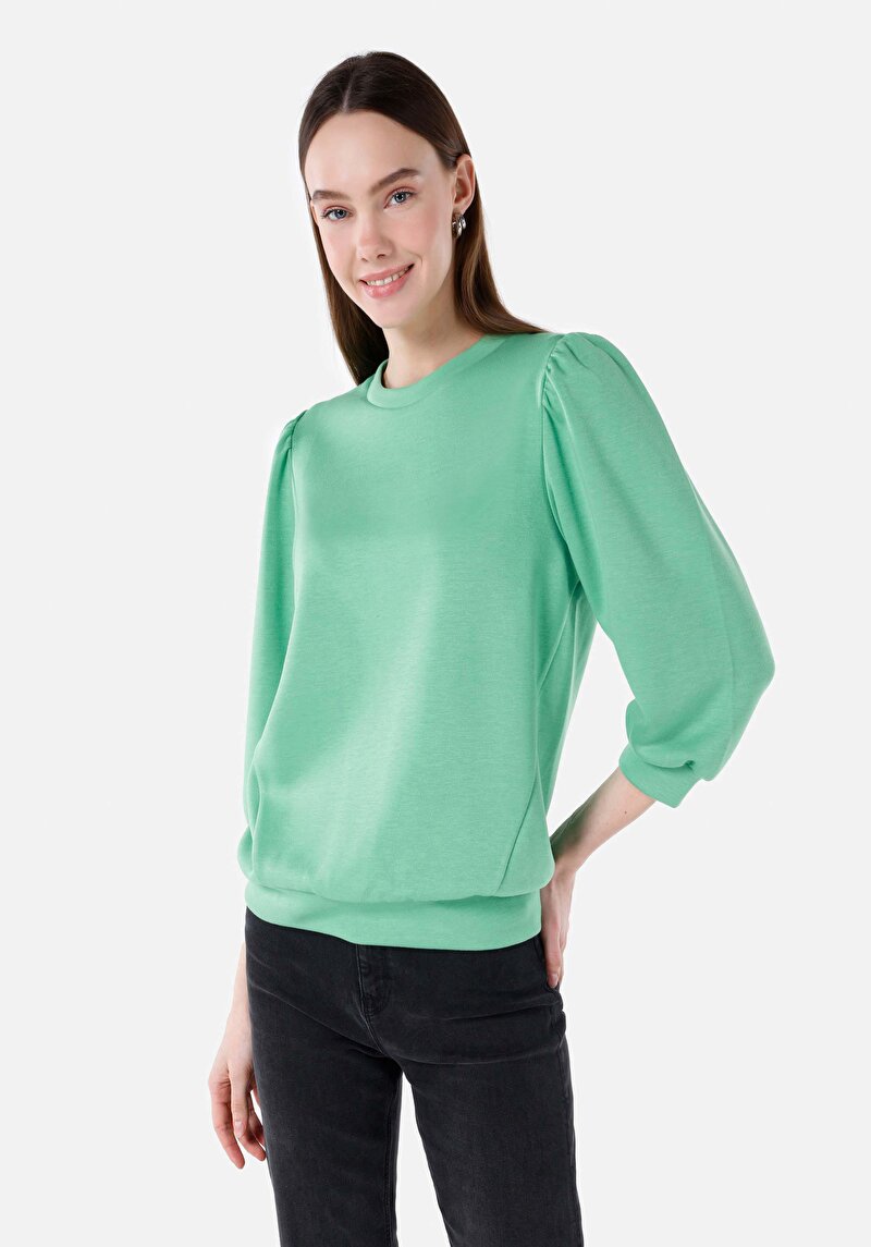 Изображение Женская зелёная футболка с длинным рукавом и круглым вырезом, стандартного кроя