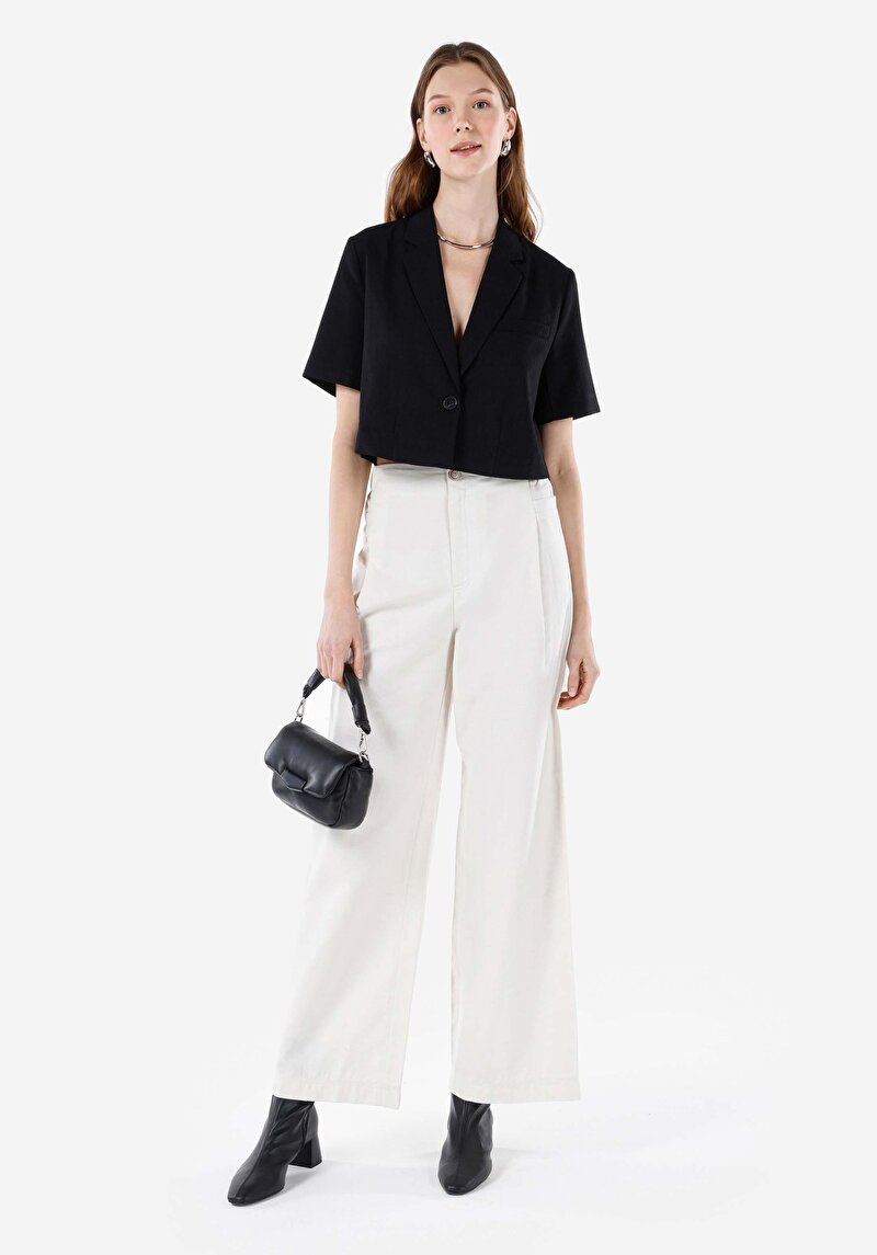 Изображение Женские белые брюки с высокой посадкой и широкими штанинами